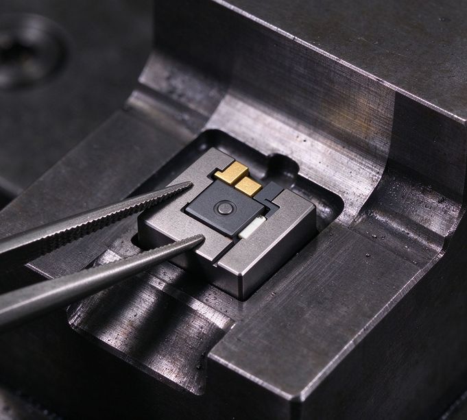 Die design cost optimization replaceable inserts